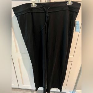 Black drawstring sweatpants with raw cuffs